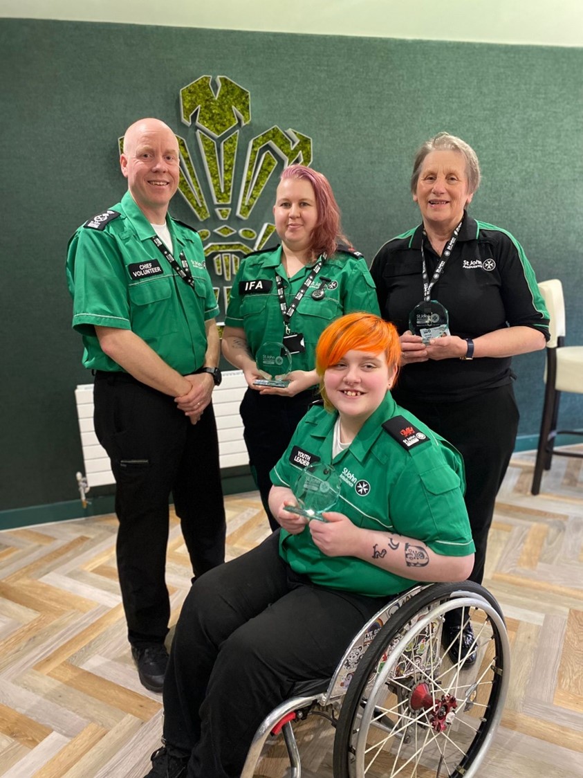 Ruth (right) is pictured with other Youth Leader award winners and St John Ambulance Cymru’s Chief Commissioner, Richie Paskell.